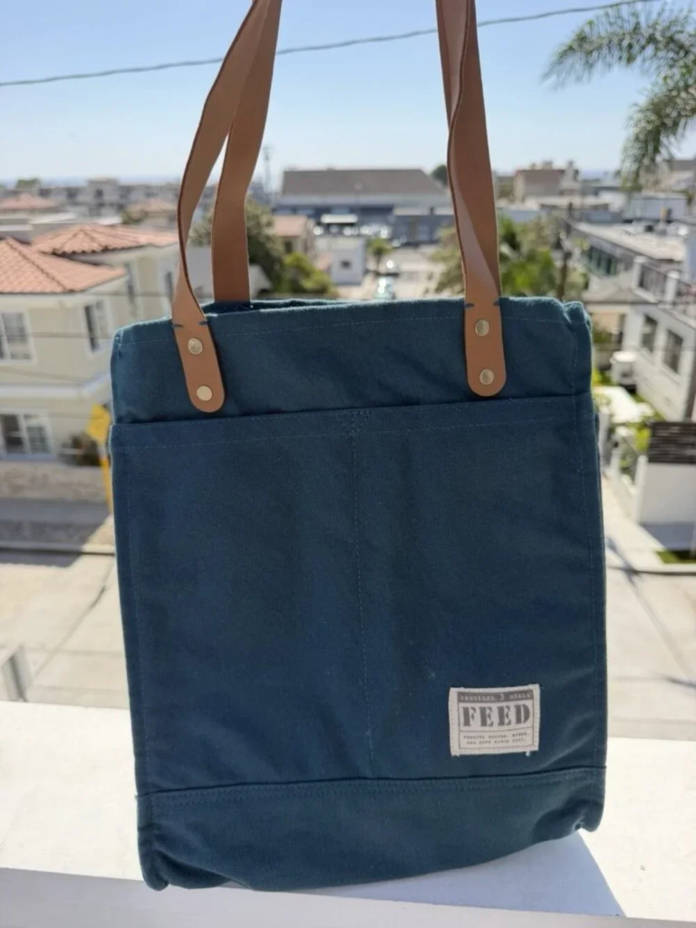 FEED Projects teal double-handle canvas pockets travel academia indie totebag
